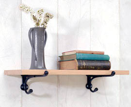 Oak shelf with cast iron brackets available in black or white