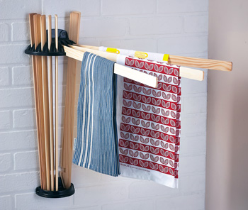 Wall mounted radial clothes airer available in black or white cast iron