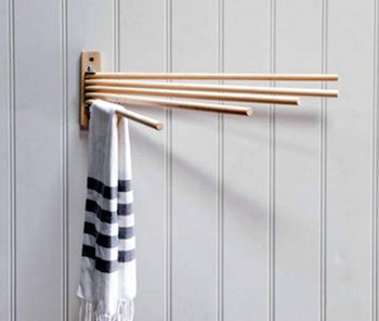 Radial fan airer made from beech dowels used to hang laundry