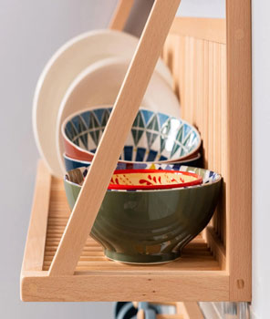 Close up of the bottom shelf of our wall mounted plate rack,