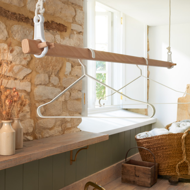Pulley operated hanging clothes rail with cast iron brackets and heavy duty beech lath