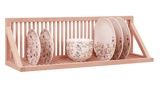 Close up detail of our wall mounted plate rack showing plates being stored next to bowls