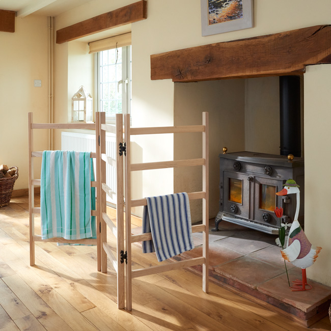 Traditional clothes airer with cast iron hinges