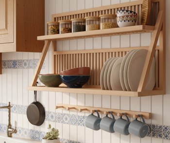 Wall mounted plate rack located about the sink in the kitchen